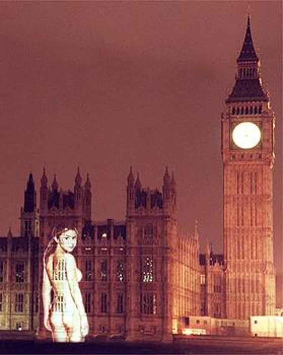 An image from her FHM shoot was projected onto the House of Parliment in 1999 (PA)