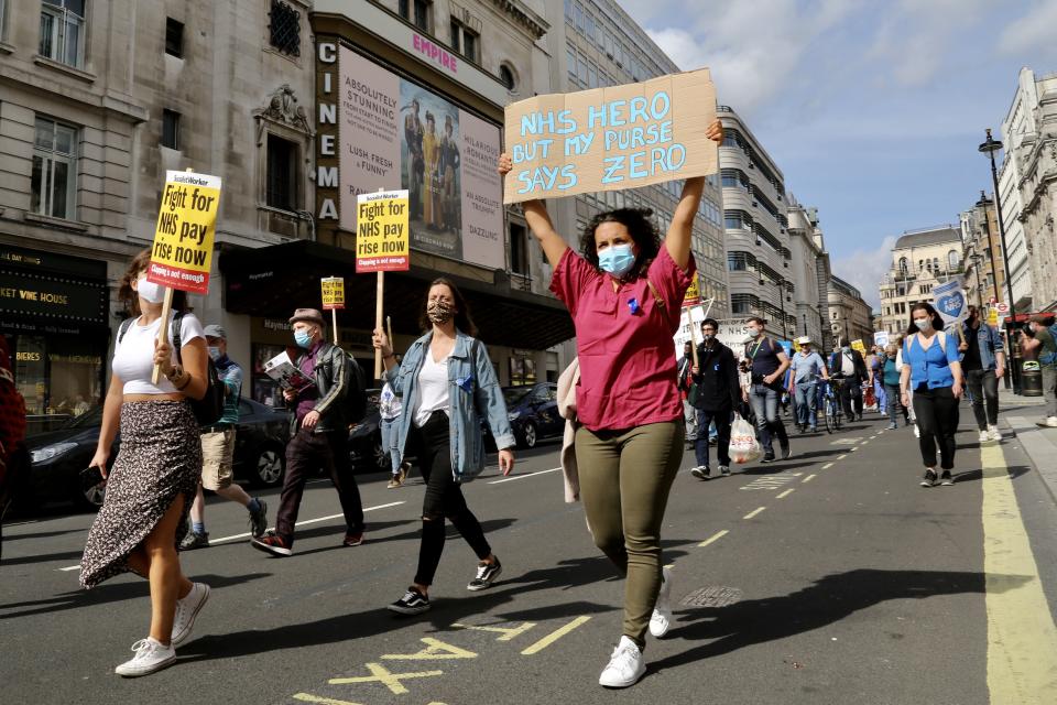 LONDON, UNITED KINGDOM- SEPTEMBER 12: NHS workers attend the 'March for Pay' Demonstration  in London, United Kingdom on September 12, 2020. (Photo by Hasan Esen/Anadolu Agency via Getty Images)