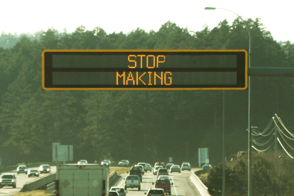 A flashing sign that reads: stop making signs with bad jokes