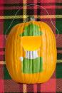 <p>Light up your porch or walkway with this jack-o'-<em>lantern</em>, or get creative and dream up your own designs.<br></p><p><strong><a href="https://www.countryliving.com/diy-crafts/g1350/pumpkin-decorating-1009/" rel="nofollow noopener" target="_blank" data-ylk="slk:Get the tutorial;elm:context_link;itc:0;sec:content-canvas" class="link ">Get the tutorial</a>.</strong> </p>