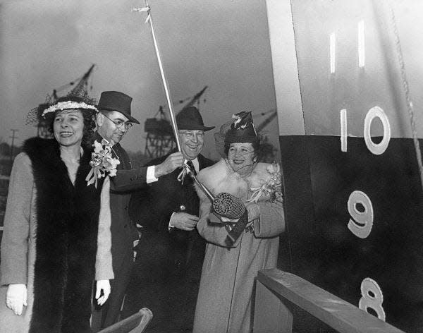 Alexander and James Merrill celebrate the christening of one of the many ships Merrill-Stevens produced over decades at it downtown Jacksonville shipyards.