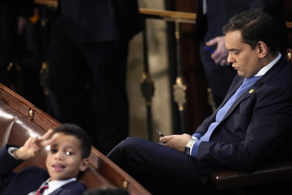 Rep.-elect George Santos, R-N.Y. sits in the chamber during opening day of the 118th Congress at the U.S. Capitol, Tuesday, Jan 3, 2023, in Washington. (AP Photo/Andrew Harnik)