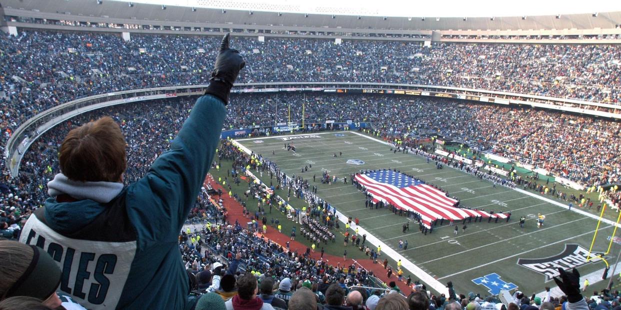 Philadelphia Eagles' fans cheer after the playing of the national anthem and just before the start of the final football game to be played in Veterans Stadium, the NFC Championship game between the Philadelphia Eagles and the Tampa Bay Buccaneers, 19 January, 2003 in Philadelphia,