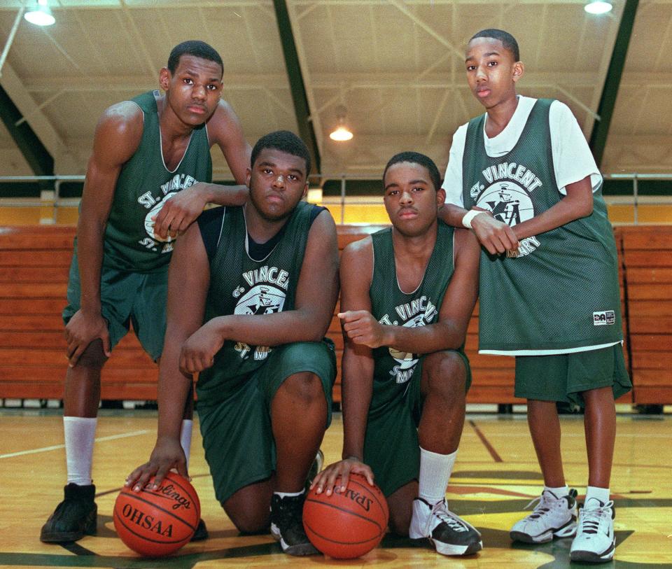 St. Vincent-St. Mary's Fab Four freshmen: from left, LeBron James, Sian Cotton, Willie McGee and Dru Joyce III in the school's gym.