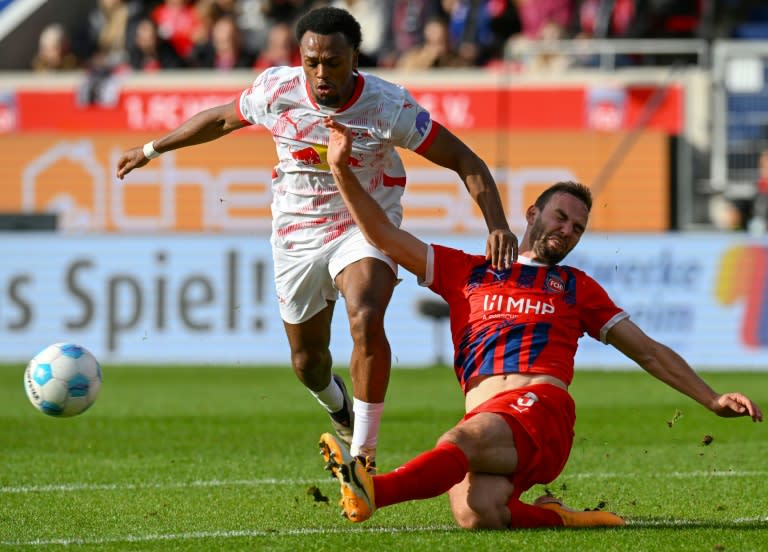 Ikoma Openda (L) scored the only goal as Leipzig recorded a fourth Bundesliga win this season (THOMAS KIENZLE)