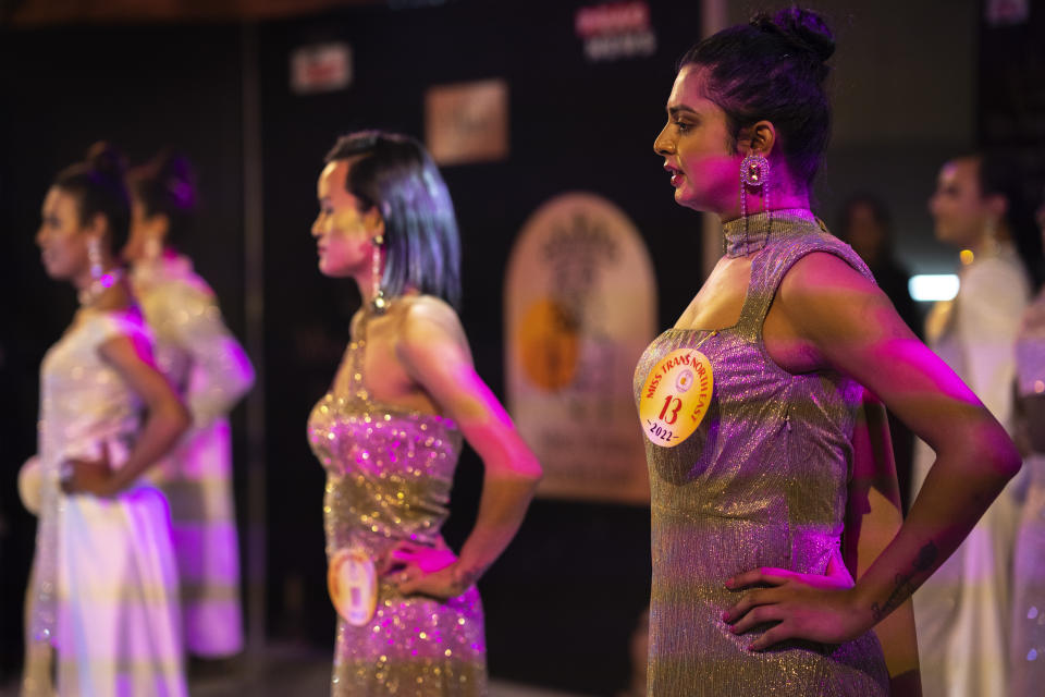 Contestants compete for the Miss Trans Northeast 22, beauty pageant in Guwahati, India, Wednesday, Nov. 30, 2022. In a celebration of gender diversity and creative expression, a beauty pageant in eastern Indian state of Assam brought dozens of transgender models on stage in Guwahati. Sexual minorities across India have gained a degree of acceptance especially in big cities and transgender people were given equal rights as a third gender in 2014. But prejudice against them persists and the community continues to face discrimination and rejection by their families. (AP Photo/Anupam Nath)