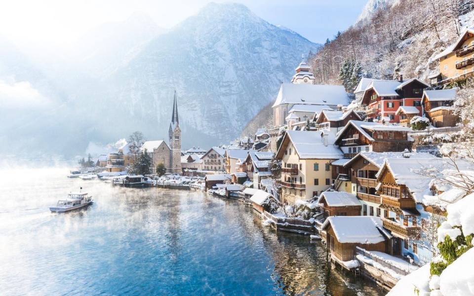 Postcard depicting the famous Hallstatt lakeside town in the Alps - iStockphoto