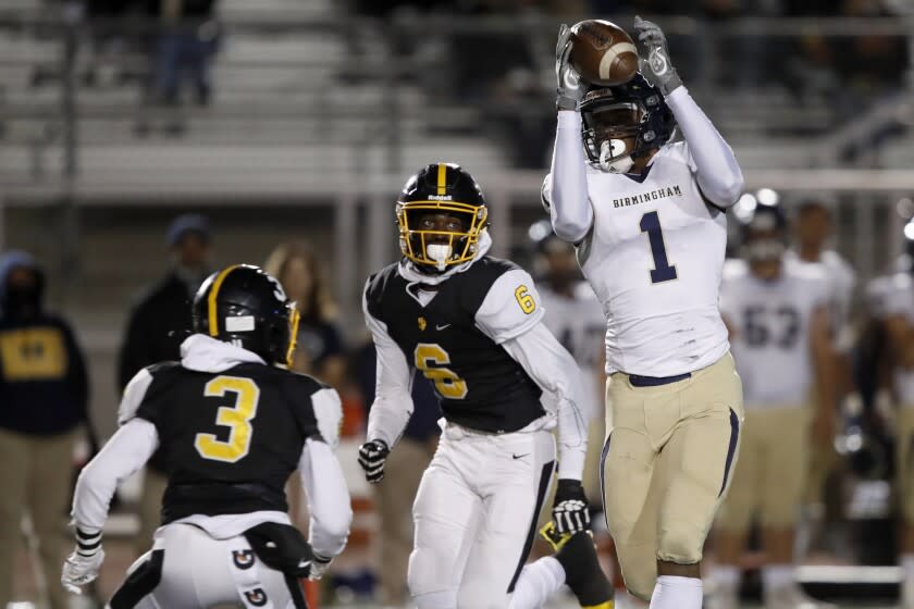 Birmingham wide receiver Arlis Boardingham (1) catches a pass and runs for a touchdown.