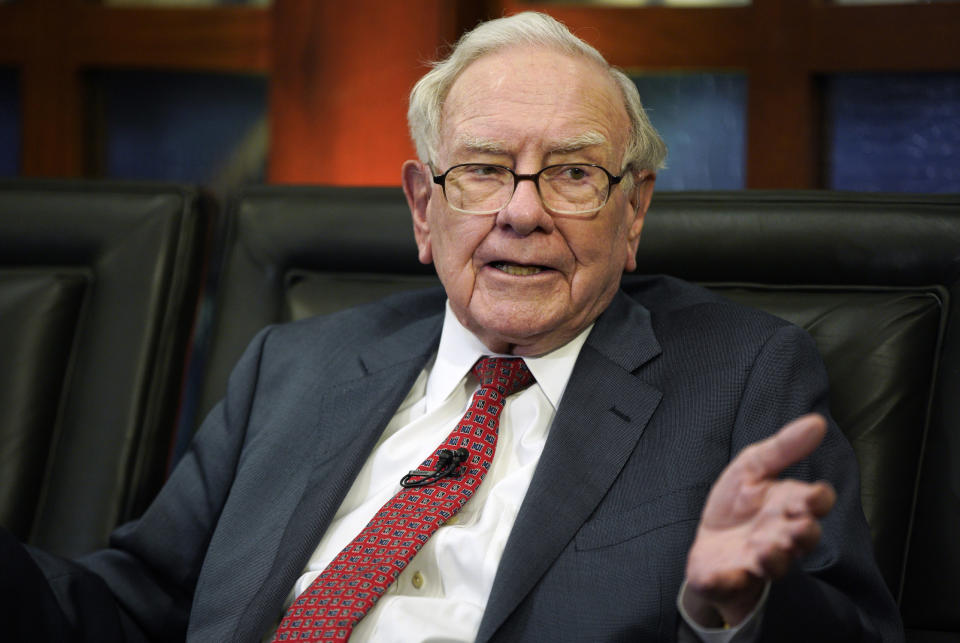 FILE- In this May 7, 2018, file photo Berkshire Hathaway Chairman and CEO Warren Buffett speaks during an interview in Omaha, Neb., with Liz Claman on Fox Business Network's "Countdown to the Closing Bell." Berkshire Hathaway Inc. reports earnings Friday, Feb. 22, 2019. (AP Photo/Nati Harnik, File)s