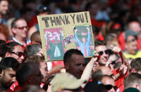 <p>Soccer Football – Premier League – Arsenal vs Burnley – Emirates Stadium, London, Britain – May 6, 2018 Fan holds up a banner in reference to Arsenal manager Arsene Wenger before the match REUTERS/Ian Walton EDITORIAL USE ONLY. No use with unauthorized audio, video, data, fixture lists, club/league logos or “live” services. Online in-match use limited to 75 images, no video emulation. No use in betting, games or single club/league/player publications. Please contact your account representative for further details. </p>