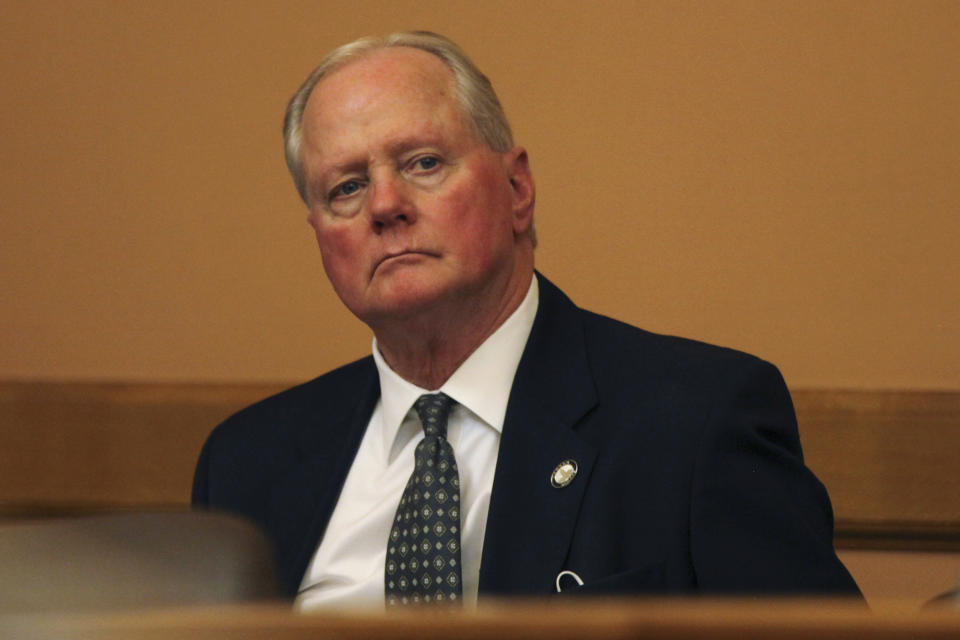 Kansas Senate Majority Leader Gene Suellentrop, R-Wichita, follows a discussion during a meeting of fellow GOP senators Wednesday, March 17, 2021, at the Statehouse in Topeka, Kan. Suellentrop is stepping away from most of his duties as majority leader following his arrest on suspicion of driving under the influence and attempting to flee law enforcement. (AP Photo/Andy Tsubasa Field)