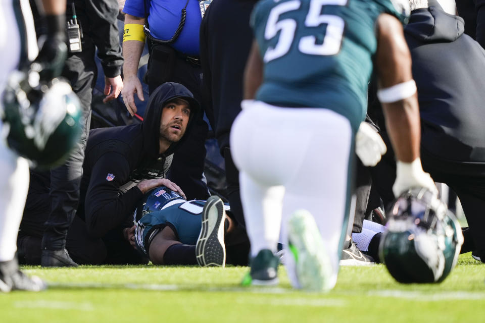 Philadelphia Eagles defensive end Josh Sweat is tended to after being injured in the first half of an NFL football game against the New Orleans Saints in Philadelphia, Sunday, Jan. 1, 2023. (AP Photo/Matt Slocum)
