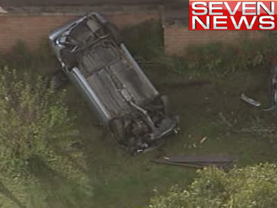 Car hits pedestrian, drives into house