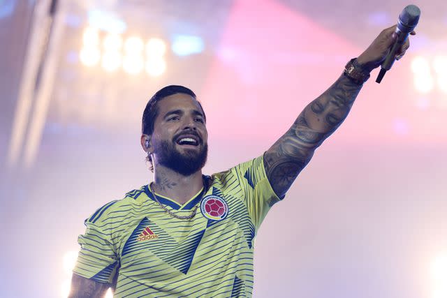 <p>Katelyn Mulcahy - FIFA/FIFA via Getty</p> Maluma performs during the Fan Festival Official Opening ahead of the FIFA World Cup 2022 in Qatar.