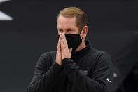 Toronto Raptors head coach Nick Nurse watches play during the second half of an NBA basketball game against the Dallas Mavericks Monday, Jan. 18, 2021, in Tampa, Fla. (AP Photo/Chris O'Meara)