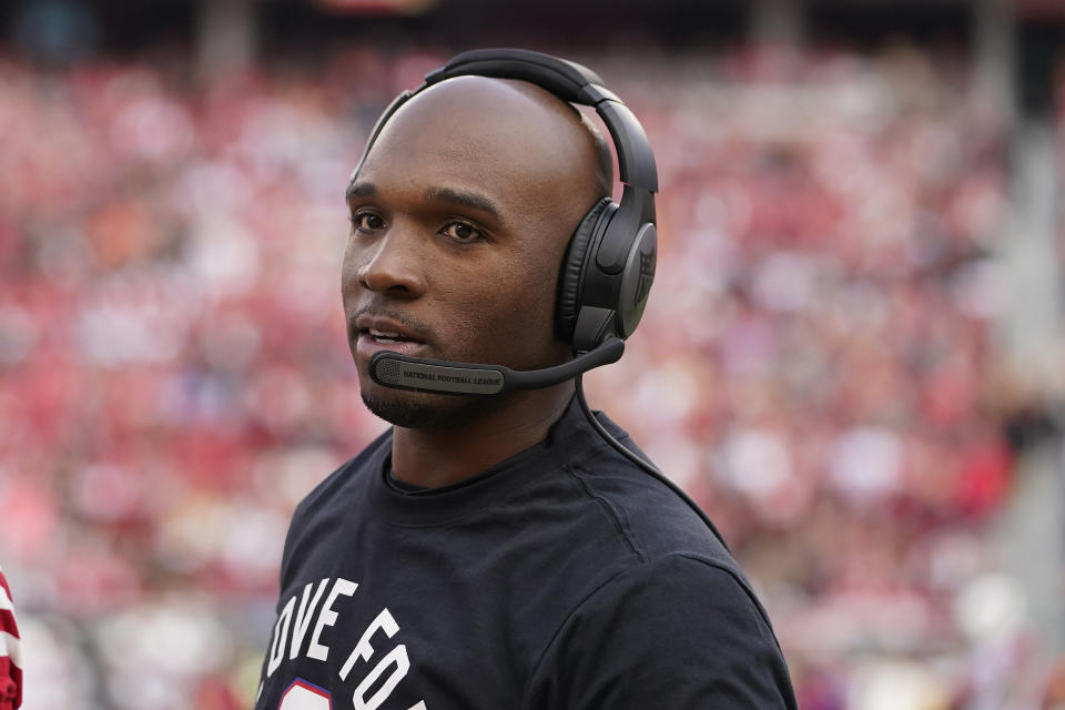 San Francisco 49ers defensive coordinator DeMeco Ryans before an NFL football game against the Arizona Cardinals in Santa Clara, Calif., Sunday, Jan. 8, 2023. The Carolina Panthers have requested permission to interview San Francisco 49ers defensive coordinator DeMeco Ryans and New England Patriots linebackers coach Jerod Mayo bringing the number of known candidates for the team’s head coaching vacancy to 10, according to a person familiar with the situation. The person spoke to The Associated Press on Thursday, Jan. 12, 2023, on condition of anonymity because the team does not make its coaching search public. (AP Photo/Godofredo A. Vásquez)