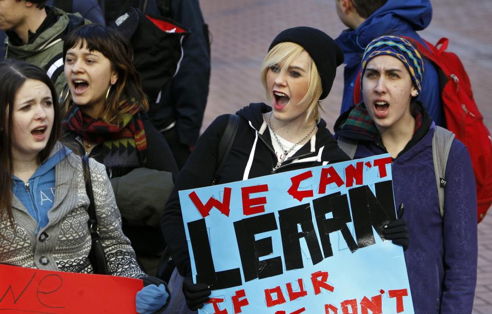Students from Lincoln high school demonstrate in support of teachers in contract negotiations during a school walkout in Portland, Oregon February 5, 2014. (REUTERS/Steve Dipaola)