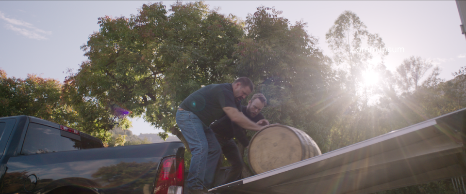 A scene from “Heist” episode five shows bourbon barrels being loaded into the back of a pickup truck. At least 18 bourbon barrels were stolen from two Kentucky distilleries in a story that will be part of a new Netflix series, coming in July.