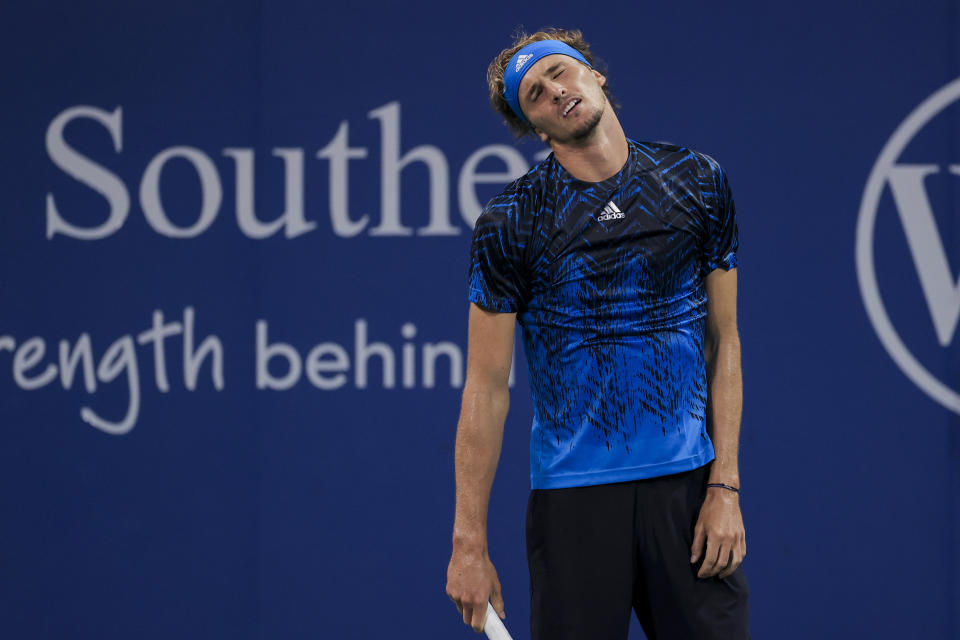 Alexander Zverev, of Germany, reacts during his match against Casper Ruud, of Norway, during the Western & Southern Open tennis tournament Friday, Aug. 20, 2021, in Mason, Ohio. (AP Photo/Aaron Doster)