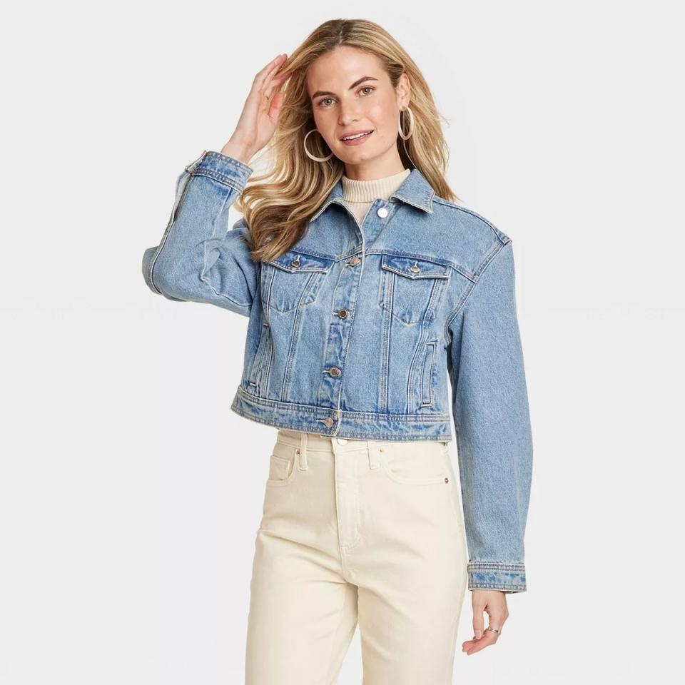 cropped light denim jacket on model