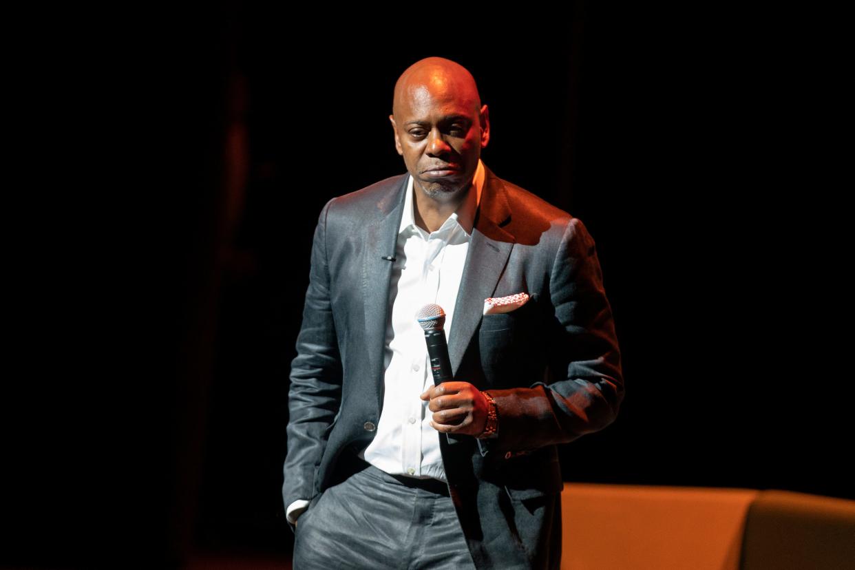 Dave Chappelle performs during a theater dedication ceremony honoring the comedian and actor, and to raise funds to support Duke Ellington School of the Arts in Washington, Monday, June. 20, 2022. (AP Photo/Gemunu Amarasinghe) ORG XMIT: DCGA106