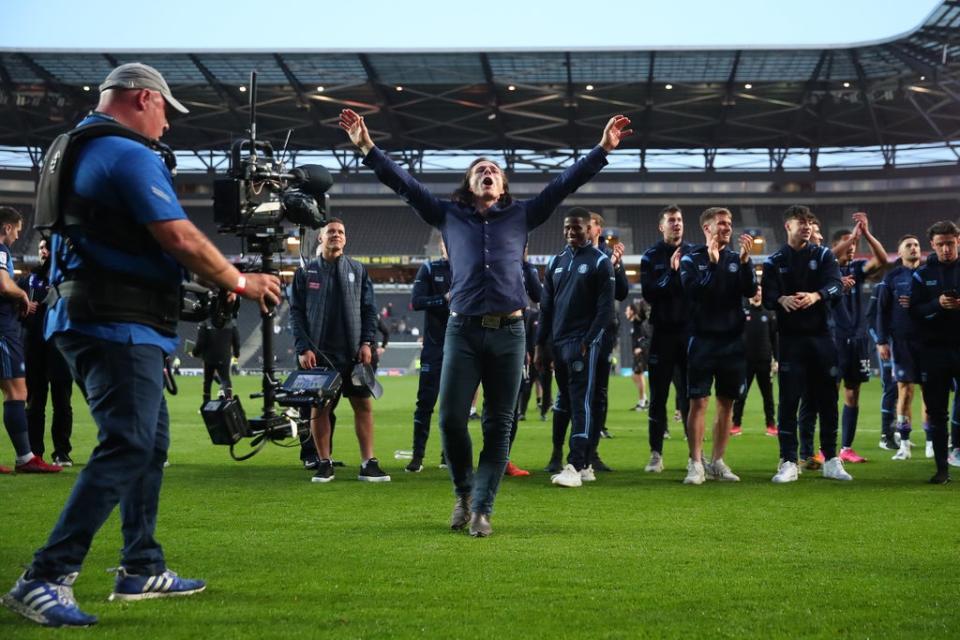 Gareth Ainsworth leads Wycombe’s celebrations after beating MK Dons in the semi-final (Getty Images)
