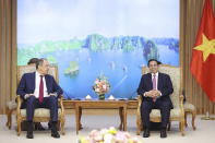 Vietnamese Prime Minister Pham Minh Chinh speaks during a meeting with Russian Foreign Minister Sergey Lavrov in Hanoi, Vietnam, Wednesday, July 6, 2022. (Duong Van Giang/VNA via AP)