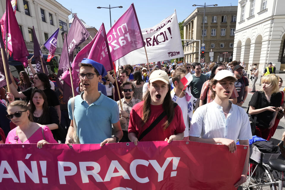 Supporters of a left-wing party march, to mark the Labor Day holiday in support of workers' rights, in Warsaw, Poland, on May 1, 2024. (AP Photo/Czarek Sokolowski)