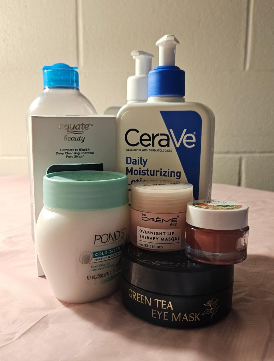 Various skincare products arranged to illustrate the skincare industry's hold on society. Skincare is a $24.35 billion revenue industry in 2024. (Hannah Amos)