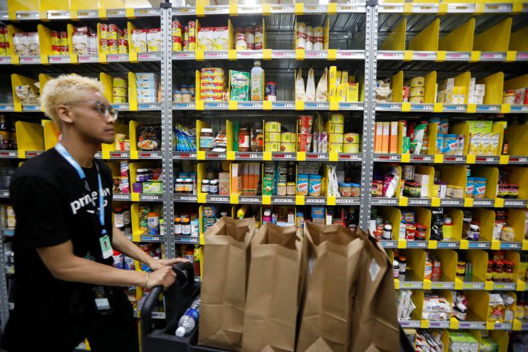 An employee works at Amazon's Prime Now fulfillment centre in Singapore July 27, 2017. REUTERS/Edgar Su