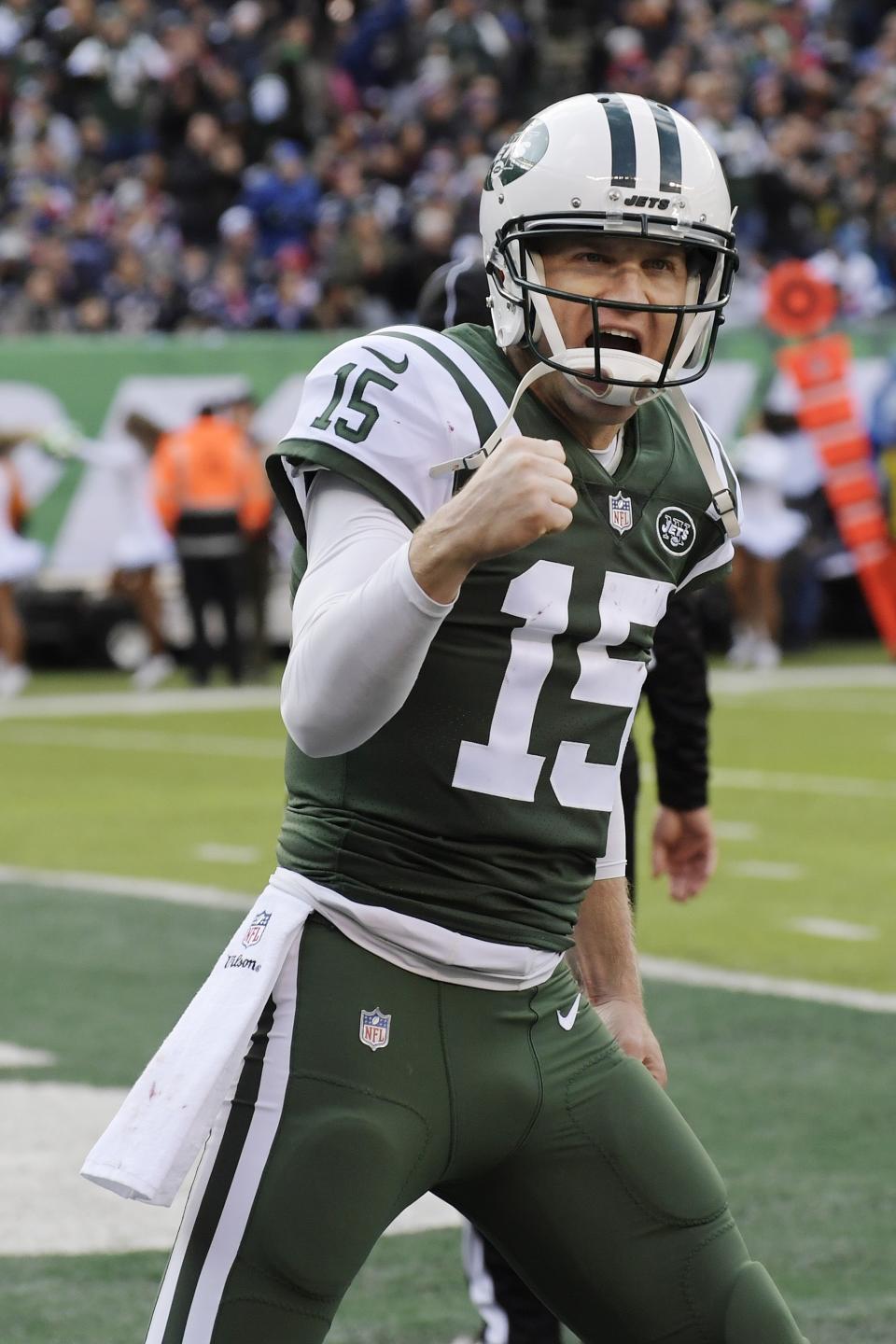 New York Jets quarterback Josh McCown (15) celebrates after throwing a touchdown pass to Jermaine Kearse during the first half of an NFL football game against the New England Patriots Sunday, Nov. 25, 2018, in East Rutherford, N.J. (AP Photo/Bill Kostroun)