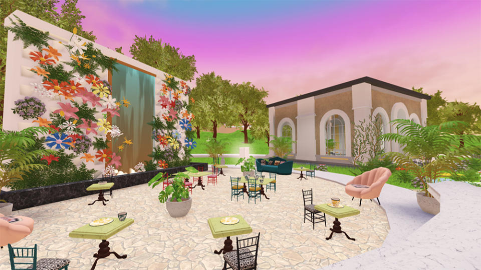 The Power-Up Place café features a fountain surrounded by colorful florals. - Credit: Gucci