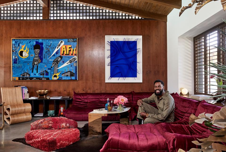 “To be honest, I never thought I would own a home—once you start to think about a home you start thinking about things like generational wealth,” Colman says, reflecting on his safe haven. Filled with meaningful keepsakes and gifts, the playwright’s dwelling is a time capsule of memories. Case in point: The Ron Haywood Jones painting titled The Amazing Afro Boy was given to Colman by his husband, Raúl Domingo.