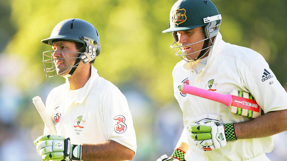 Matthew Hayden (pictured right) jogging off with Ricky Ponting (pictured left).