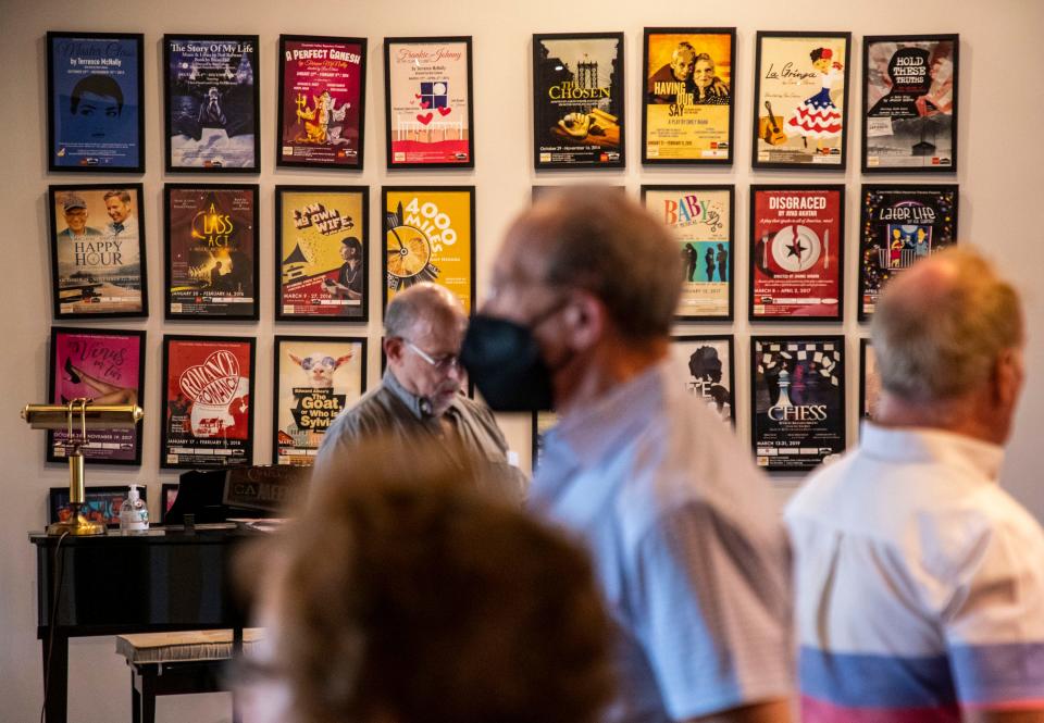 A variety of show posters are seen framed on the wall in the lobby at the Coachella Valley Repertory in Cathedral City, Calif., Thursday, May 19, 2022.