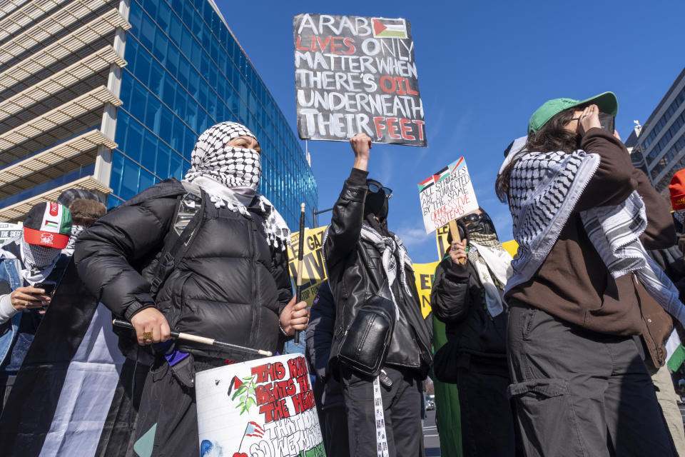 Pro-Palestinian protesters block the intersection of E St NW at New Jersey Ave. NW, near the Capitol, Thursday, Feb. 1, 2024, in Washington. (AP Photo/Jacquelyn Martin)