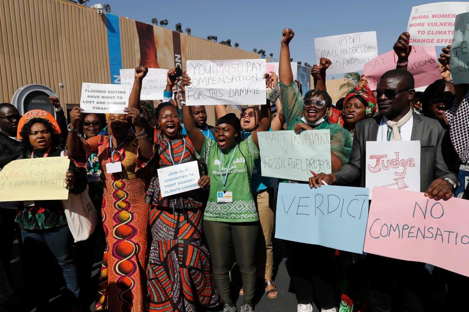 Demonstrators shout slogans during a protest outside the venue hosting the Cop27 climate conference, at the Sharm el-Sheikh International Convention Centre (AFP via Getty Images)