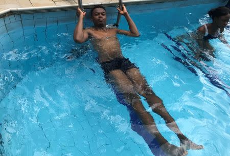 A tourist is seen in the pool at Ikogosi Warm Springs resort in Ekiti, Ekiti State, Nigeria November 11, 2018. Picture taken November 11, 2018. REUTERS/Seun Sanni