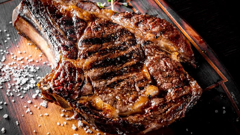 charred steak on wood