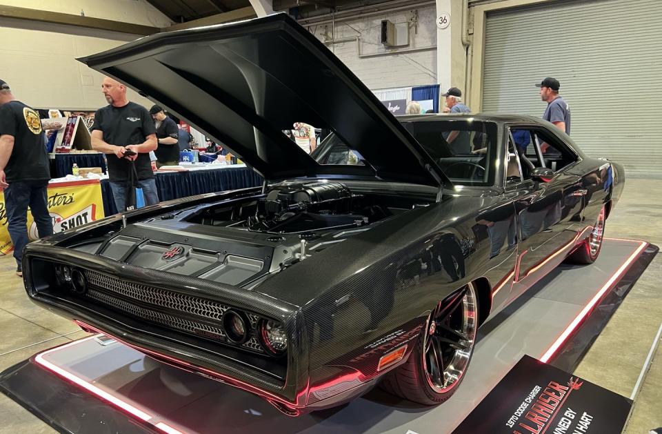 <p>How does Kevin Hart spend all the money he makes with those Chase credit card and Draft Kings online sports betting commercials? How about a carbon fiber 1970 Charger called Hellraiser?</p><p>Built by Speedkore and first shown in 2021, it’s startling in person. The 7.0-liter, supercharged “Hellephant” Mopar V8 supposedly makes 1000-horsepower. Which is a lot.</p>