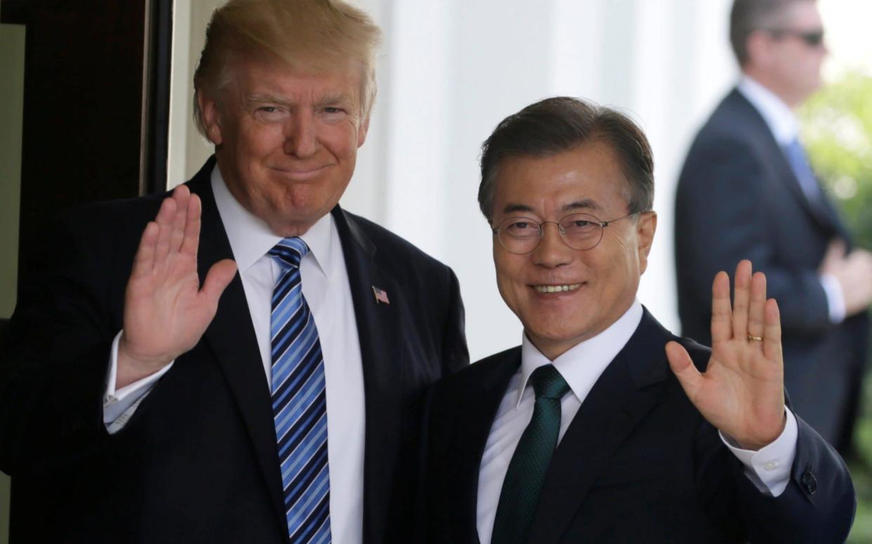 Donald Trump, the US president, and Moon Jae-in, the president of South Korea, at the White House last June - REUTERS