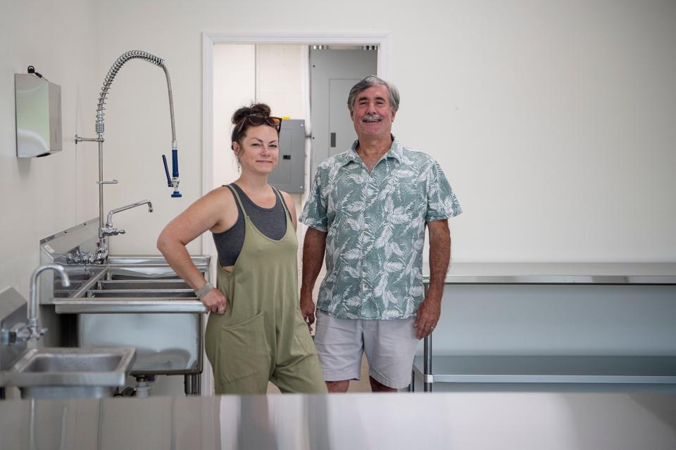 The Village Food Truck Park's manager, Amber Sloan (left), and owner, Bob Turner (right) in the venue's commissary kitchen.