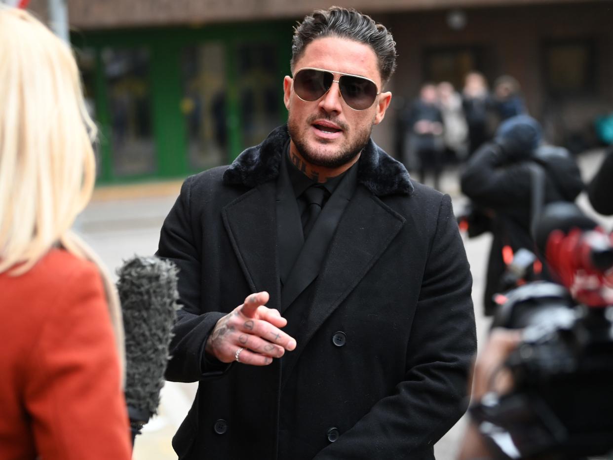 photo of Stephen Bear wearing sunglasses outside of court