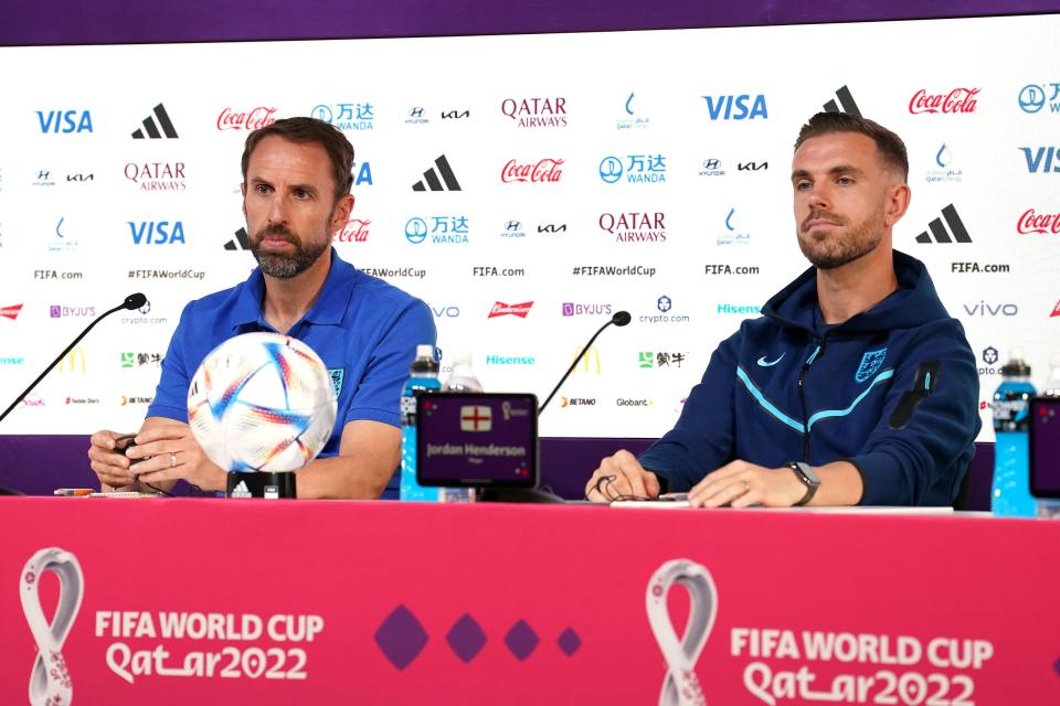 England manager Gareth Southgate (left) and player Jordan Henderson during a press conference (PA)