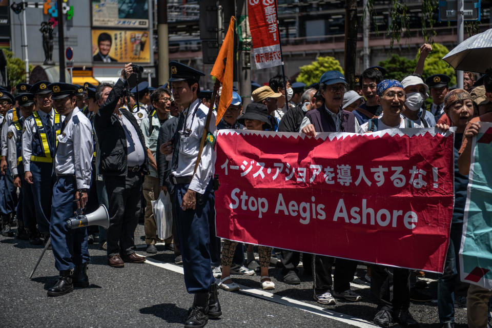 People protest against U.S.-developed Aegis Ashore missile interceptor systems being based in Japan during a demonstration against a visit by President Donald Trump to Japan, May 25, 2019 in Tokyo. / Credit: Carl Court/Getty