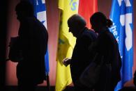 FIFA president Sepp Blatter (centre) leaves the stage during the 65th FIFA Congress in Zurich