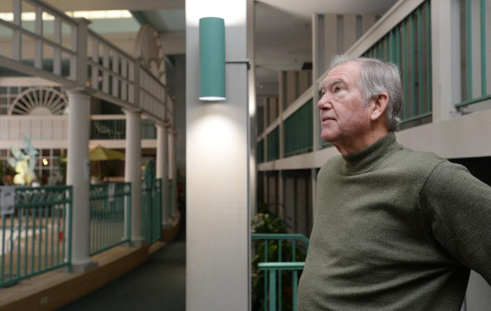Kerry Schwab, whose family owned the Bel-Aire, is shown in the complex's atrium area during renovations on Jan. 10, 2019.