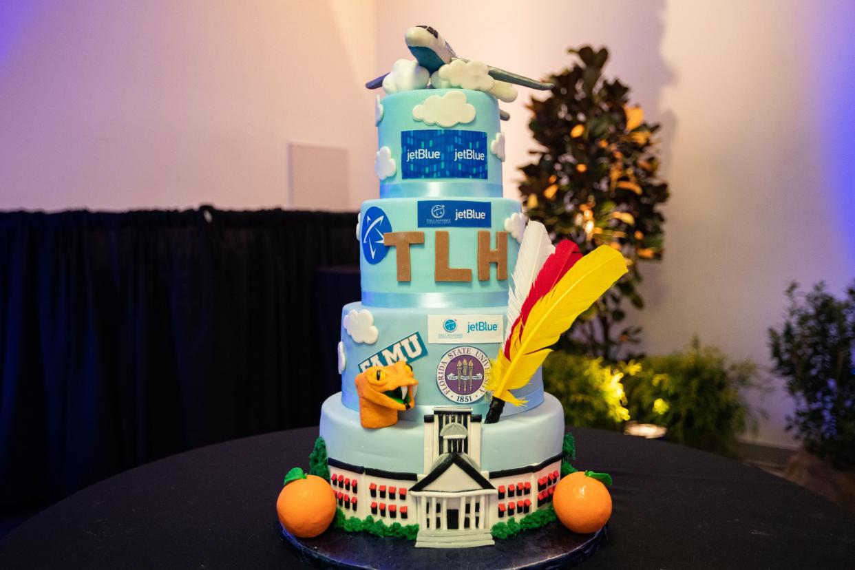 Maria Streety, executive pastry chef at Artistic Confections Inc., designed a Tallahassee and JetBlue themed cake to celebrate jetBlue now offering flights at the Tallahassee International Airport, Thursday, Jan. 4, 2024.