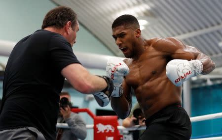 Boxing - Anthony Joshua Media Work Out - Sheffield, Britain - October 17, 2017 Anthony Joshua in action during the work out with trainer Robert McCracken Action Images via Reuters/Matthew Childs