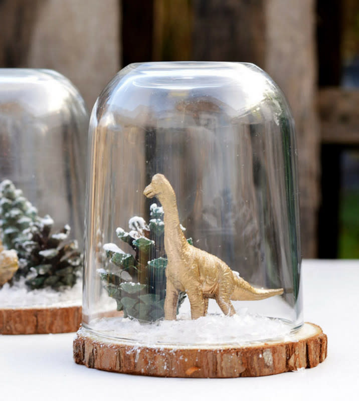 <p>Pillar Box Blue</p><p>If your kid is going through a dino phase, show them this craft by <em><a href="https://www.pillarboxblue.com/christmas-cloche-dinosaur-terrarium/?ref=pcrorganicgglunkwn&prid=pcseogglunkwn" rel="nofollow noopener" target="_blank" data-ylk="slk:Pillar Box Blue;elm:context_link;itc:0;sec:content-canvas" class="link ">Pillar Box Blue</a></em>. They’ll want to place it in their room this winter.</p>